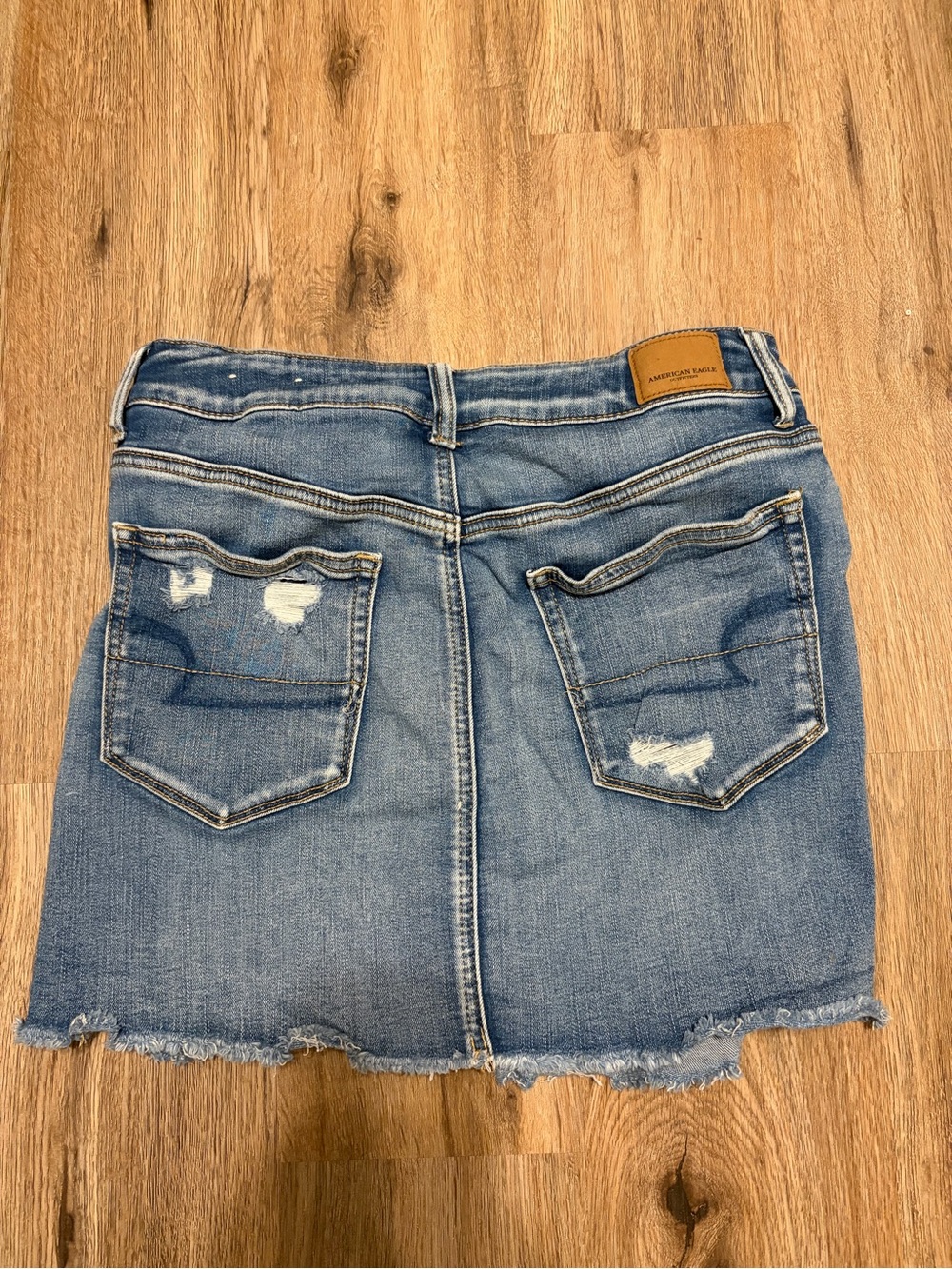 Women’s American Eagle Outfitters Distressed Denim Mini Skirt - Medium Wash - Picture 3 of 7